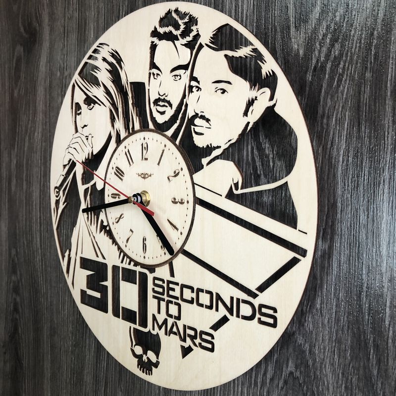 Концептуальний настінний годинник в інтер`єр "Thirty Seconds to Mars"
