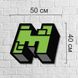 Дерев'яний настінний логотип комп'ютерної гри «Minecraft»