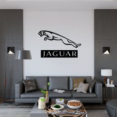 Декоративный элемент на стену из дерева в виде значка Jaguar