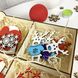 Новорічний набір кольорових дерев`яних іграшок в подарунковій коробці